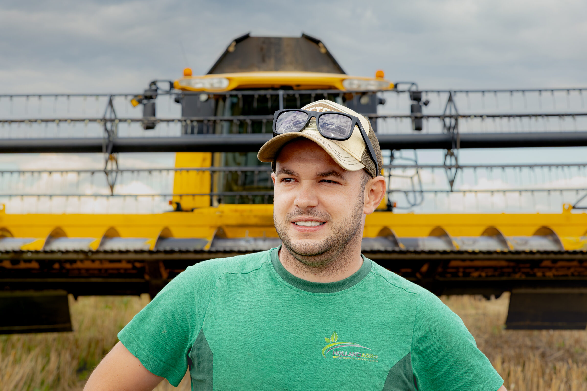 Bob van Ansem in front of a Holland Agro machine